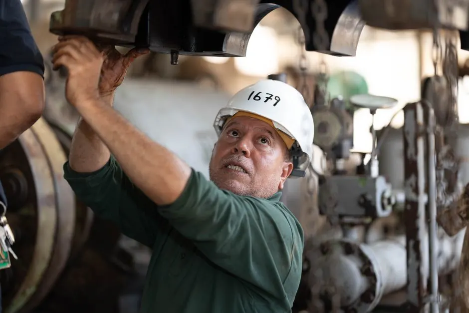 Technician using tools during a service visit